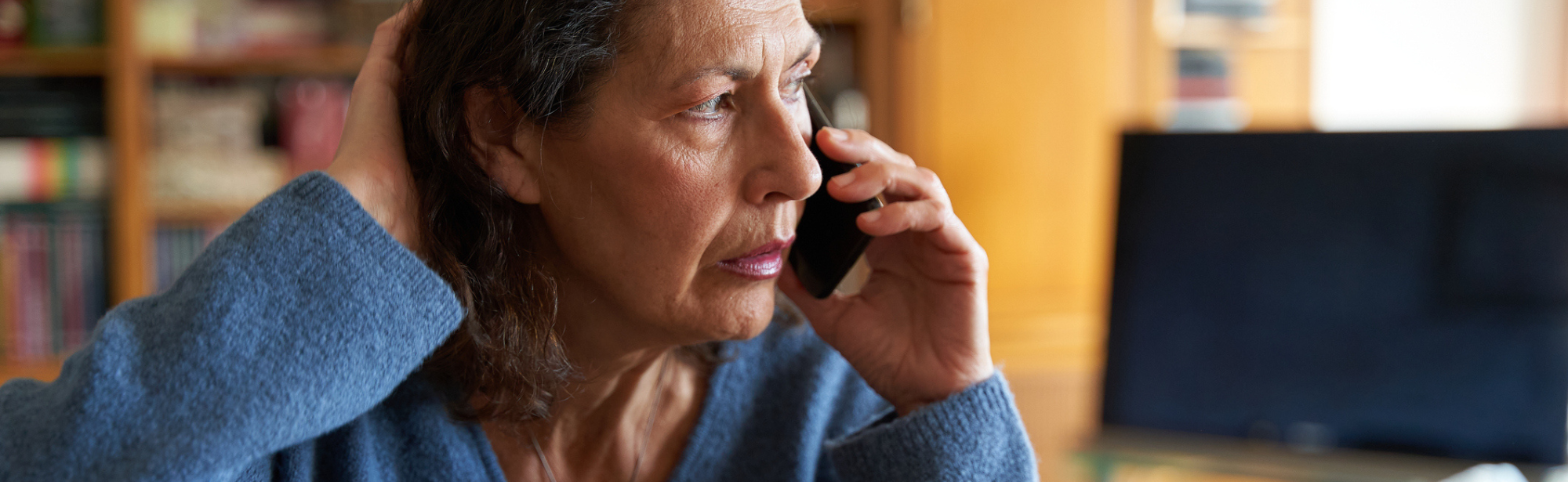 Worried woman on phone