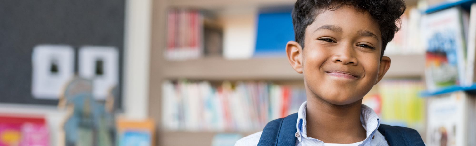 Smiling boy in classroom